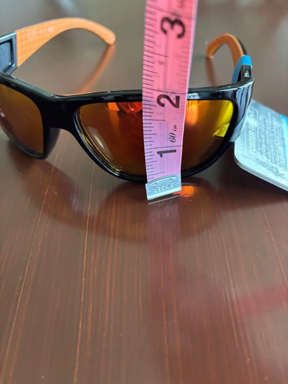 Foster Grant 100% UVA-UVB protect,black frame,rainbow mirror lens, rubber temple